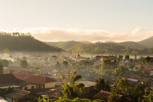 Cityscape on morning time at village of Bajawa city, Indonesia. Sunrise and sea of mist landscape with the city.; Shutterstock ID 1351292078; purchase_order: -; job: -; client: -; other: -